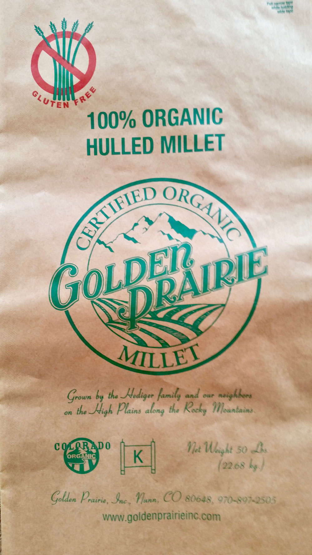 brown millet bag with golden prairie logo